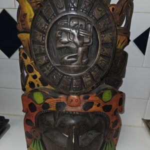 Carved Wooden Tribal Mask with Colorful Accents